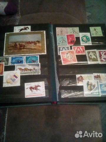 Коллекция марок в альбоме