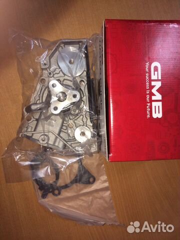 Помпа водяная Киа Спектра / Рио 1