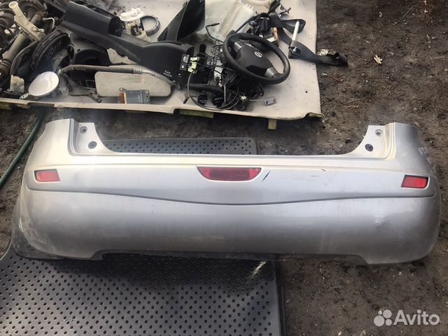 Бампер задний Nissan Note E11