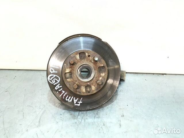 Кулак поворотный передний левый Mazda Familia