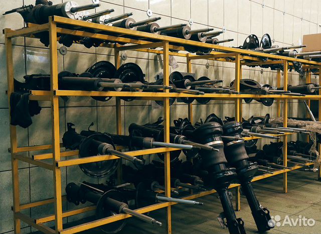 Mazda Demio DW 97-03 Стойка передняя правая