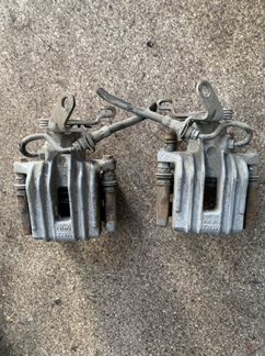 Суппорт тормозной задний Volkswagen Skoda