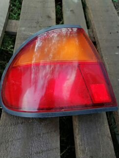 Фонарь задний левый Mazda 323 BA