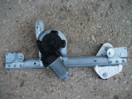 Рено Логан - правый задний эл. стеклоподъемник