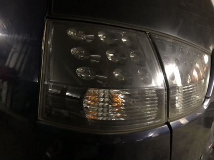 Фонарь левый наружный Mitsubishi Outlander XL