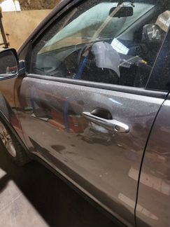 Дверь передняя левая Актион нью 2010-17