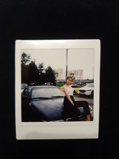 Фотограф с полароидом Instax SQ6