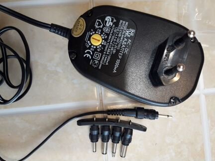 Многофункциональный блок питания с разными насадка