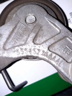 Ролик натяжитель в сборе,оригинал GM
