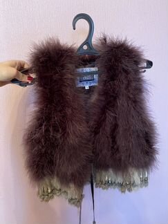 Меховая жилетка